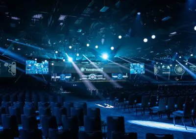 an event stage setup by Crescent Event Productions. The event is likely related to "Funnel Hacking" based on text visible on the screens.